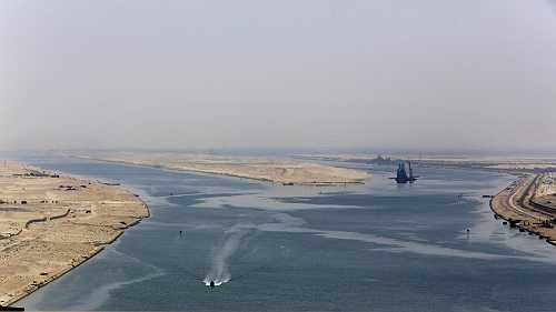 Massive Container Ship Runs Aground in Suez Canal, Halting Traffic