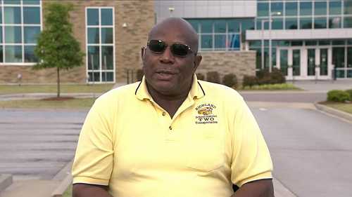 Bus driver says questions from kindergartners helped stop armed hijacker