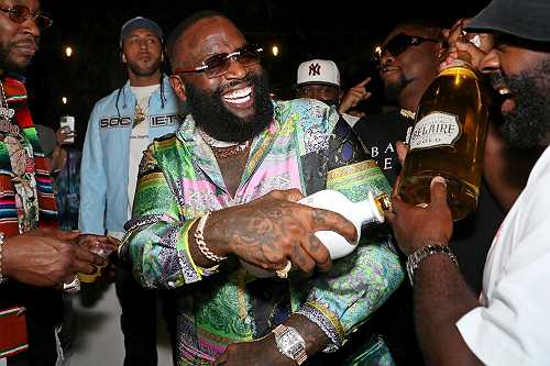 ‘Once I Got It Going, I Didn't Stop’: Rick Ross Says He Started Mowing His Own Yard After Learning How Much Boxer Evander Holyfield Spent on the Service