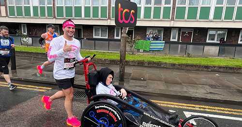 This man with cerebral palsy and his racing partner aim to complete their 6th Abbott World Marathon Major