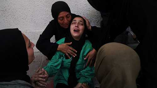 Israeli strikes kill 52 in Gaza including 36 in a school-turned-shelter, medics say