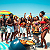 Post: The image portrays a lively beach scene filled with Black men and women enjoying a festive summer...