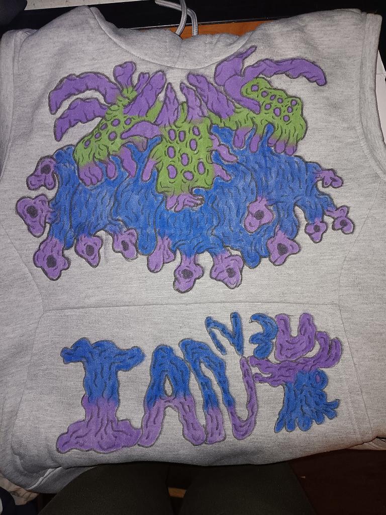 A front and back of a muscle jacket I made